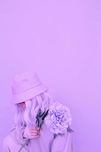 Vanilla flowers girl. purple colours monochrome trends. fashion concept ideal for bloggers