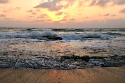 Scenic view of sea against sky during sunset