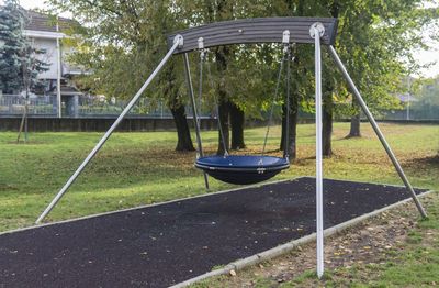 Empty swing in park