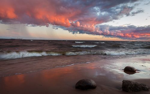 Scenic view of sea against sky during sunset