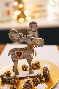 Close-up of figurine on table