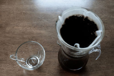 High angle view of coffee cup on table