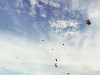 Low angle view of hot air balloons against sky