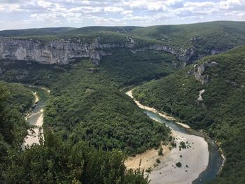 Scenic view of tree mountains against sky