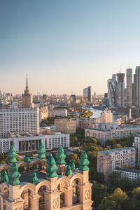 Cityscape against clear sky