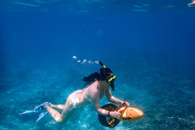 Man swimming in sea