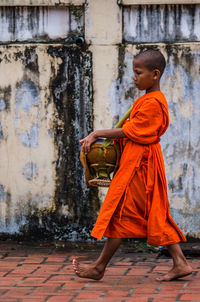 Full length of boy standing outdoors