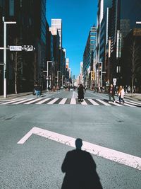 People walking on street in city 
