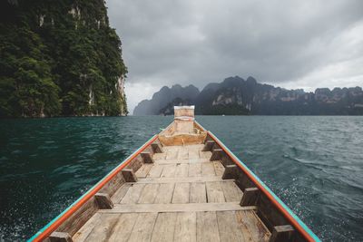 Pier over lake against sky