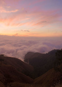 Scenic view of mountains against sky during sunset