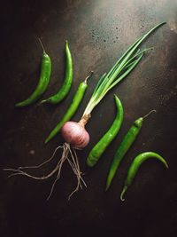 High angle view of chili peppers on table