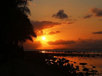 Scenic view of sea at sunset