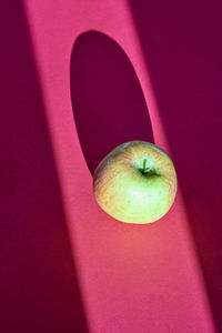 High angle view of apple on table