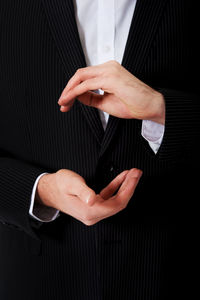 Midsection of man holding hands
