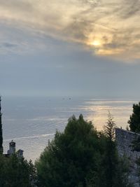 High angle view of sea against sky during sunset