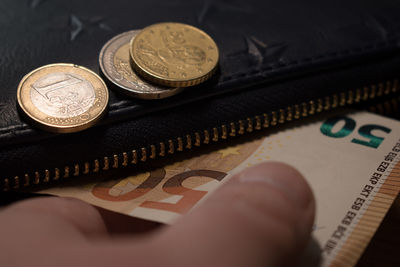 High angle view of coins