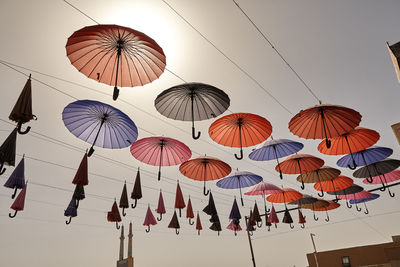 Low angle view of decoration hanging against sky