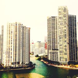 Buildings in city at dusk