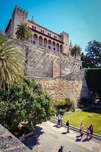 People at historical building