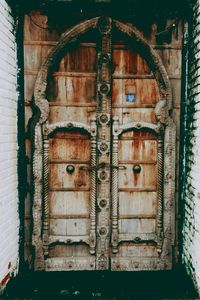 Closed wooden door of historic building