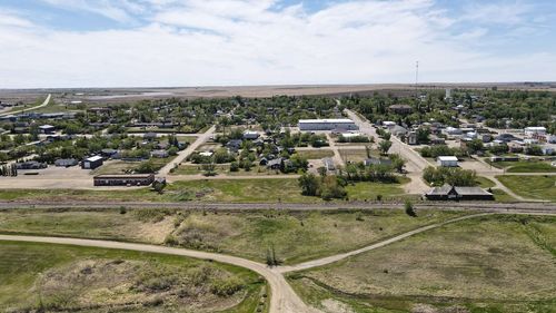 High angle view of the small town of kerrobert saskatchewan amidst the growing fields and vast sky.