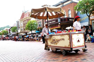 People on street in city