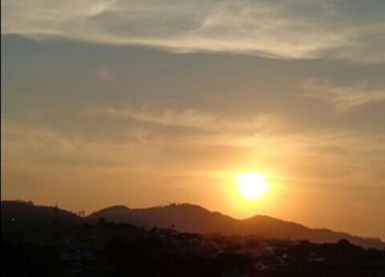 Scenic view of mountains at sunset