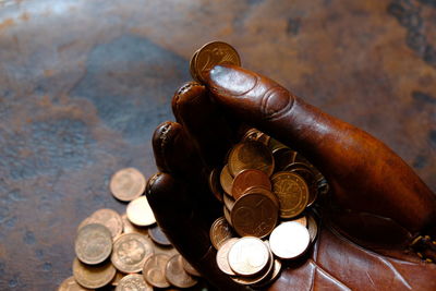 High angle view of coins on table