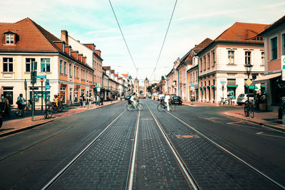 Tramway in city against sky