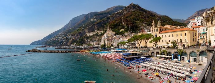 Panoramic view of boats moored at sea