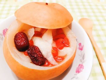 Close-up of strawberries in plate on table