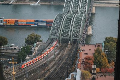 High angle view of railway bridge over river in city