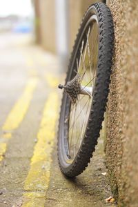 Close-up of bicycle on road