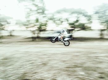 Side view of bicycle on motorcycle