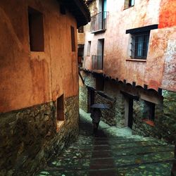 Narrow alley with buildings in background