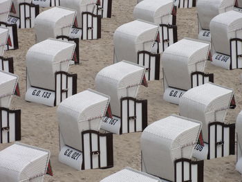 Hooded chairs on beach