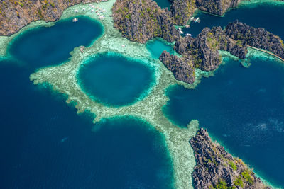 High angle view of rock formation in sea