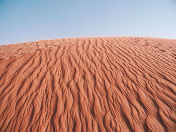 Scenic view of desert against clear sky