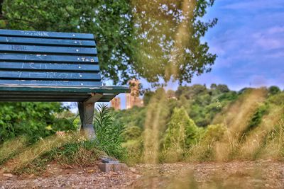 Empty bench in park