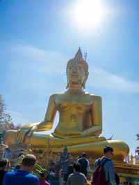 Low angle view of statue against sky