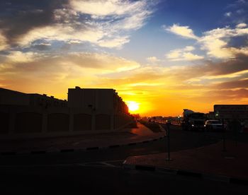 Built structure against sunset sky