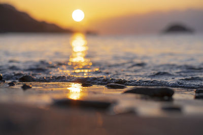 Scenic view of sea against sky during sunset