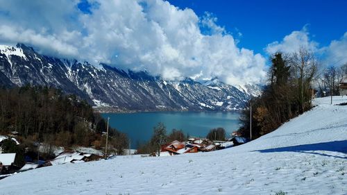 Panoramic view of snowcapped mountains against sky