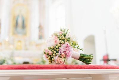 The bride's wedding bouquet is on the table