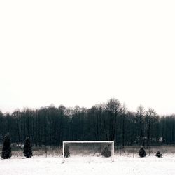 Scenic view of snow covered field