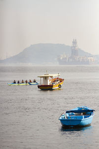 Boat in sea against sky