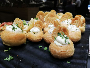 Close-up of serving food on table