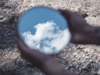 Close-up of hand holding bubble