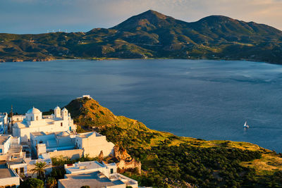 View of plaka village on milos island on sunset in greece