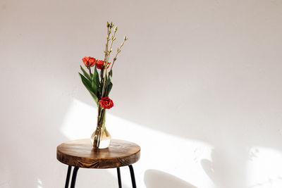 Close-up of flower vase on table